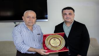 İKSAD Enstitüsü ve Herkari Bilim Sanat Edebiyat Derneği Temsilcileri Rektörümüzü Ziyaret Etti