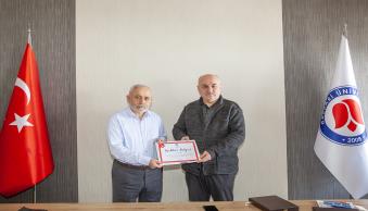 Rektörümüze Teşekkür Plaketi Takdim Edildi